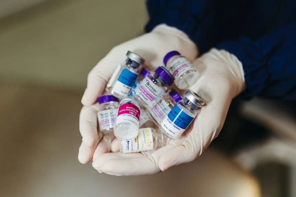 Botox Flasks on Doctor Hands