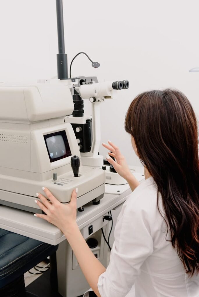 Ophthalmologist working with medical machine in laboratory